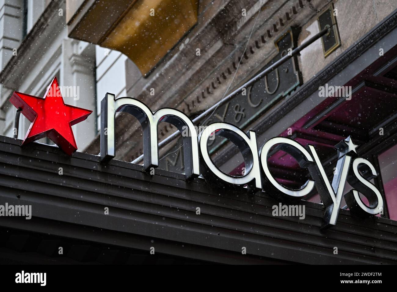 Macy’s cut its full-year profit guidance