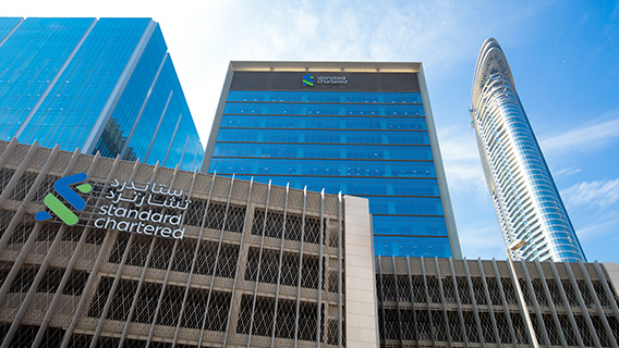 Standard Chartered reported sharply higher net profit